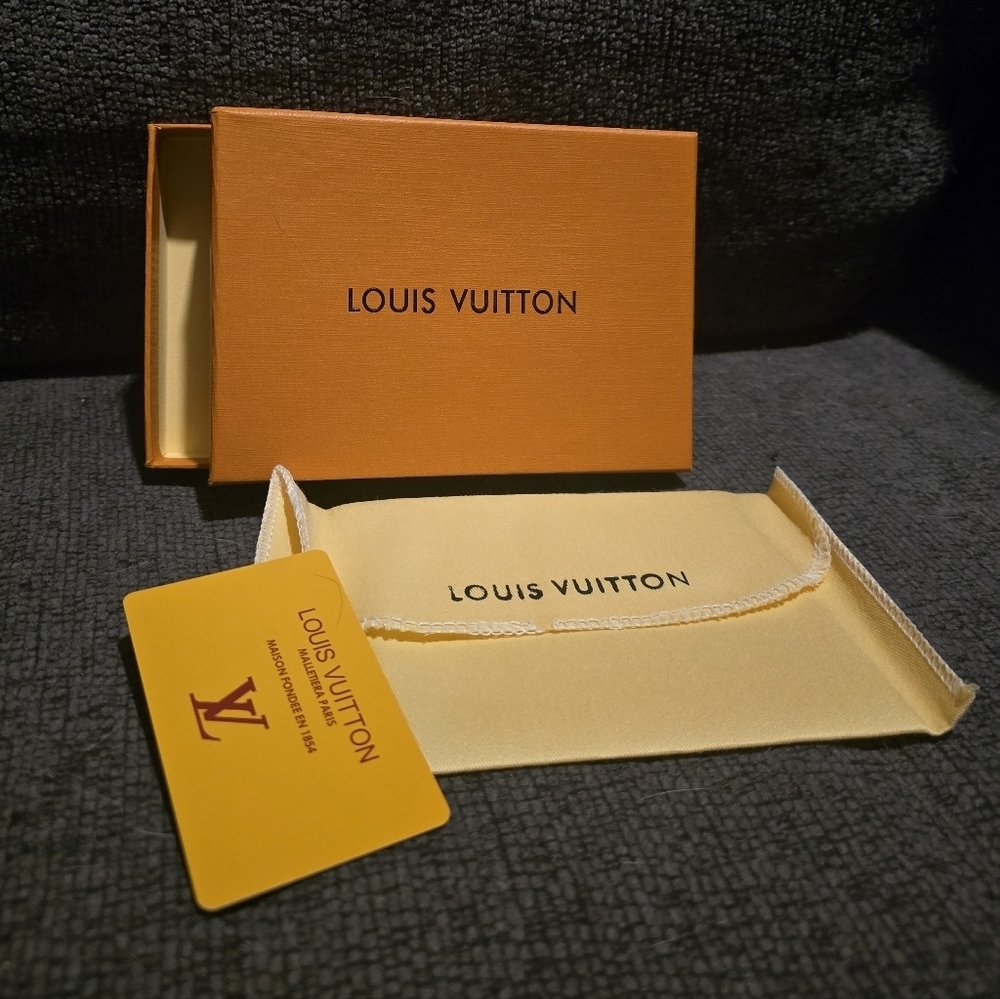 Louis Vuitton | Orange Box with Yellow Card